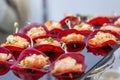 Appetizing canapes on the buffet table. Fish delicacies in vegetable chips. Catering for events and celebrations. Close-up