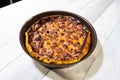 Appetizing cherry clafoutis made at home in the old fashioned way in France Royalty Free Stock Photo