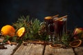 Appetizing christmas composition glasses of mulled wine on spruce cone and branch background. fragrant spices. Festive mood. Hot Royalty Free Stock Photo