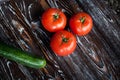 Appetizing composition of fresh vegetables, carrots and cucumber on a table