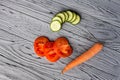 Appetizing composition of fresh vegetables on a wooden light textured table