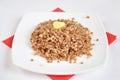 Appetizing crumbly buckwheat with butter