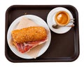 Appetizing ham sandwich and a cup of hot coffee. Healthy breakfast Royalty Free Stock Photo