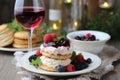 Appetizing desserts paired with various beverages such as pastries, cakes, berries, close-up