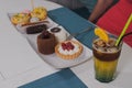 Appetizing desserts on a plate in a cafe.