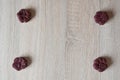 appetizing dog muffins on wooden background. dog birthday. red velvet. paw shaped dog treat. homemade dog biscuit. paw bakery