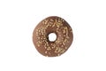 Appetizing donut in chocolate icing with nuts on a white background. Isolated