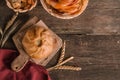 Appetizing fresh culinary pastry - beautiful curly pie on a wooden background with copy space Royalty Free Stock Photo