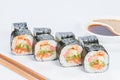 Appetizing fresh set of sushi rolls with rice, shrimps, avocado, Royalty Free Stock Photo