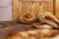 Appetizing freshly baked oriental tortillas on a wooden table