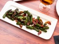 Appetizing fried asparagus with ham and foie gras