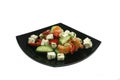 Appetizing greek salad on a plate. Royalty Free Stock Photo