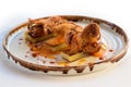 Appetizing grilled Octopus with aubergine and red paprika