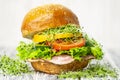 Appetizing hamburger with lard and meat, yellow pepper