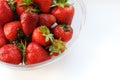 Appetizing home strawberry in a bowl with copy space. Summer vitamin fruits