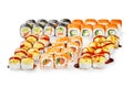 Appetizing Japanese sushi rolls set with salmon, masago, cheese on white Royalty Free Stock Photo