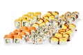 Appetizing large Japanese sushi rolls set for company on white background Royalty Free Stock Photo