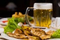 Appetizing Main Course with Dipping Sauce and Beer Royalty Free Stock Photo