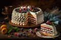 appetizing multi-layer birthday cake on table in spreading cream with decorations