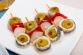 Pickled anchovy rolls with olives, pepper, onion Royalty Free Stock Photo