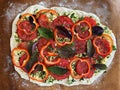 Flat bread with ricotta, tomatoes, bell peppers and herbs. Step by step. Step 1 Royalty Free Stock Photo