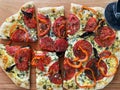 Flat bread with ricotta, tomatoes, bell peppers and herbs. Step by step. Step 2 Royalty Free Stock Photo