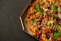 Appetizing pizza with smoked sausages bacon meat tomato cheese arugula Royalty Free Stock Photo