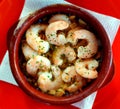 An appetizing pot of shrimps boiled in a garlic bouillon