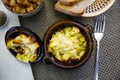 Appetizing roast with potatoes, served in clay pot