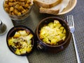 Appetizing roast with potatoes, served in clay pot