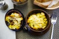 Appetizing roast with potatoes, served in clay pot