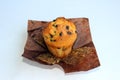 Appetizing, ruddy, tasty vanilla muffin with chocolate pieces