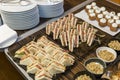 Appetizing sandwiches and snacks on the buffet table. Close-up. Business meetings and celebrations