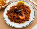 Appetizing seafood dish Paella with shrimp