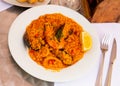 Appetizing seafood dish Paella with shrimp