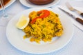 Appetizing seafood dish Paella with shrimp. Spanish cuisine