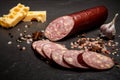 appetizing sliced cheddar summer sausage with cheese and garlic Royalty Free Stock Photo