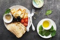 Appetizing snack with fried cheese haloumi, olives, bruschetta, tomatoes, olives, pine nuts, olive oil, honey and Royalty Free Stock Photo