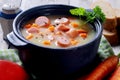 Appetizing Soup Dish on Black Pot Royalty Free Stock Photo