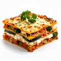 Appetizing square lasagna portion showcasing multiple vibrant layers of ingredients on white background Royalty Free Stock Photo