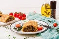 Appetizing strudel with minced beef Royalty Free Stock Photo