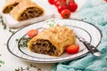 Appetizing strudel with minced beef Royalty Free Stock Photo