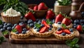 food tartlets cream, strawberries, blueberries mint sweet fresh dessert pastry