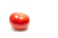 Appetizing tomato on white background