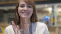 Applauding, Headshot of Happy Young Woman Clapping in Cafe Royalty Free Stock Photo