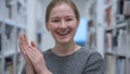 Applauding, Headshot of Happy Young Woman Clapping in Cafe Royalty Free Stock Photo