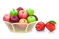 Apples with water drops in basket isolated on white.