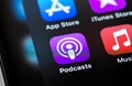 Apple AppStore, Podcasts, iTunes, Music mobile apps on screen