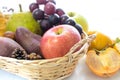 Apple and autumn fruits in a basket Royalty Free Stock Photo