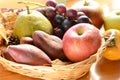 Apple and autumn fruits in a basket Royalty Free Stock Photo